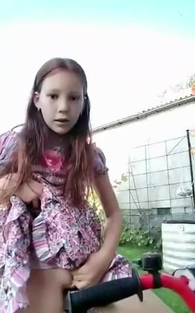 Hot 7yo girl exposing pussy during bike ride