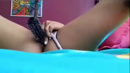Horny schoolgirl masturbates pussy with comb (homemade)