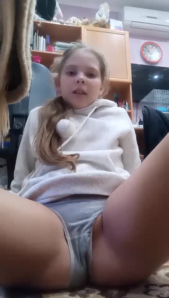 Girl watching child porn on phone between her legs while fingering her pussy crazy cp lover girl